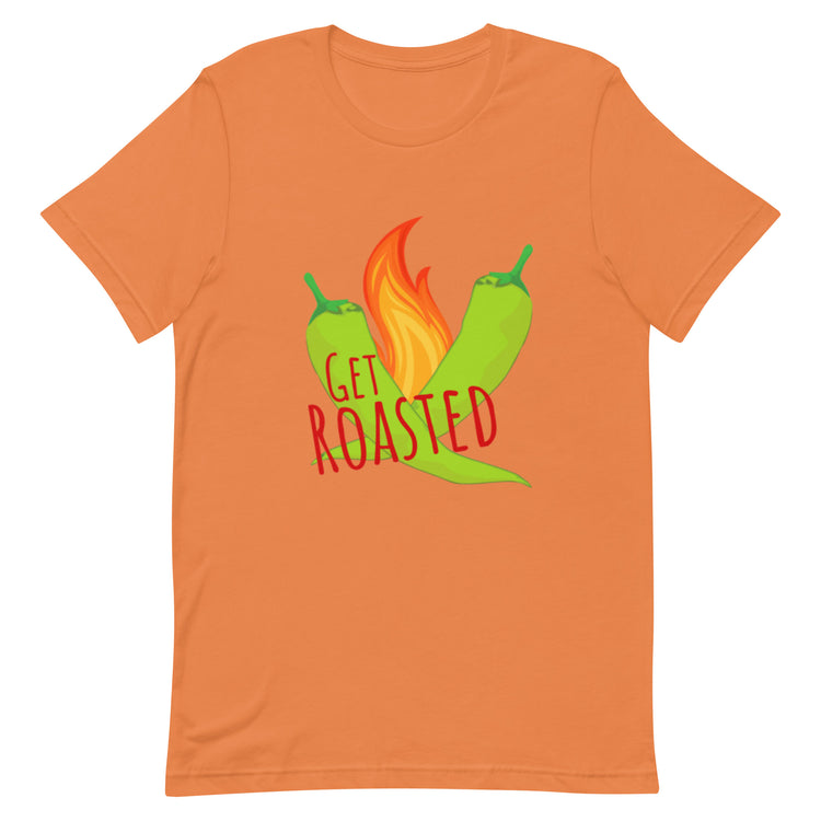 An orange Get Roasted Shirt with a graphic of two green chili peppers and a flame between them. The text "GET ROASTED" is written in bold red letters across the chili peppers and flame. Made from lightweight cotton tee, this perfect t-shirt ensures comfort with its pre-shrunk fabric.