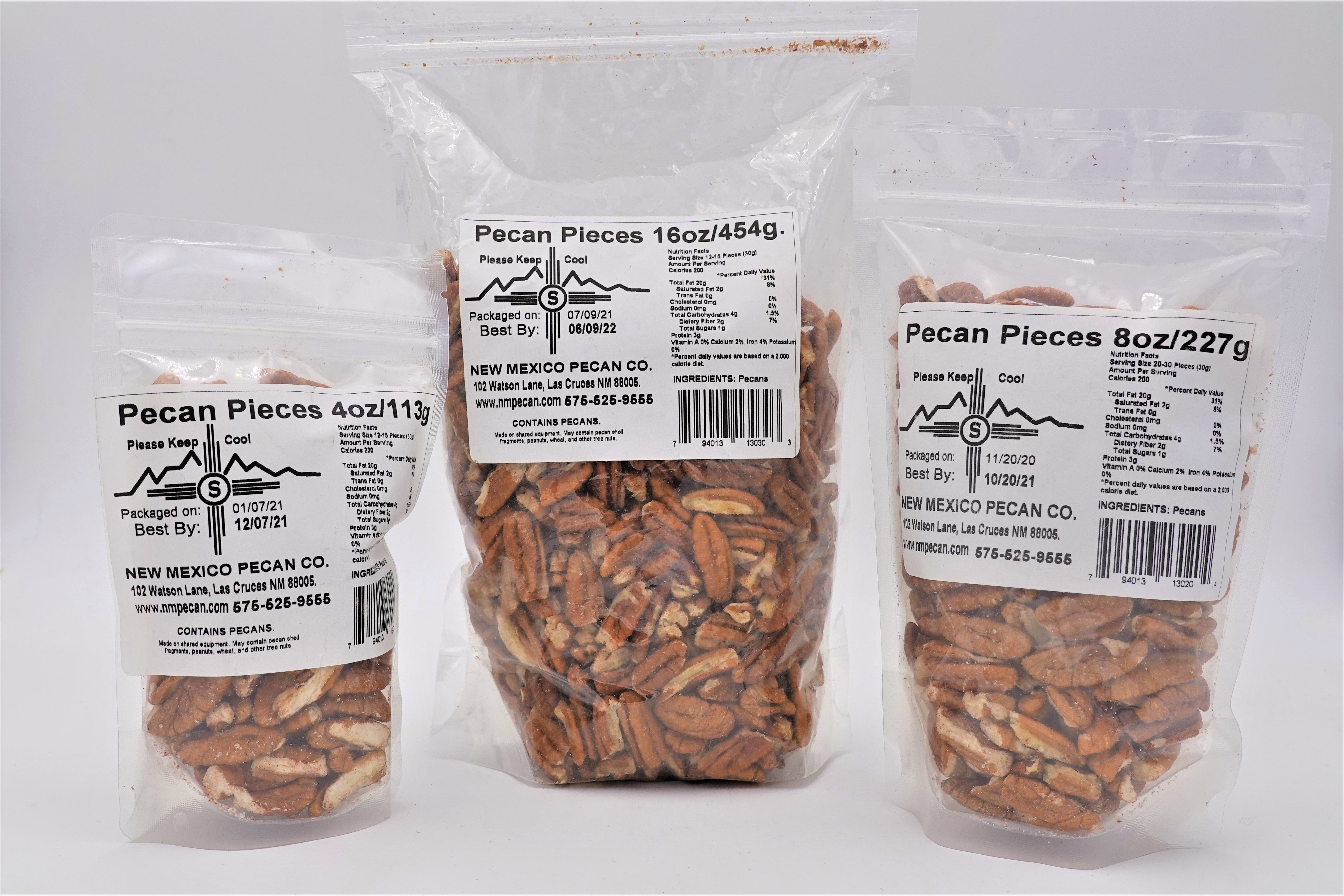 Three bags of Pecan Pieces, ideal as healthy snacks and stocking-stuffers, of different sizes with labels showing product details and barcodes, displayed against a white background.