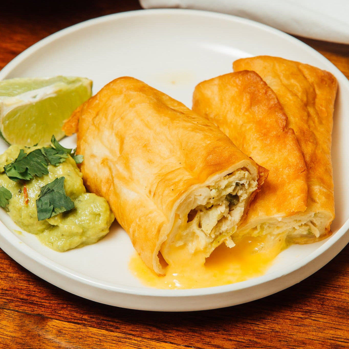 Cheesy Green Chile Chicken Chimichangas - Two Peas & Their Pod